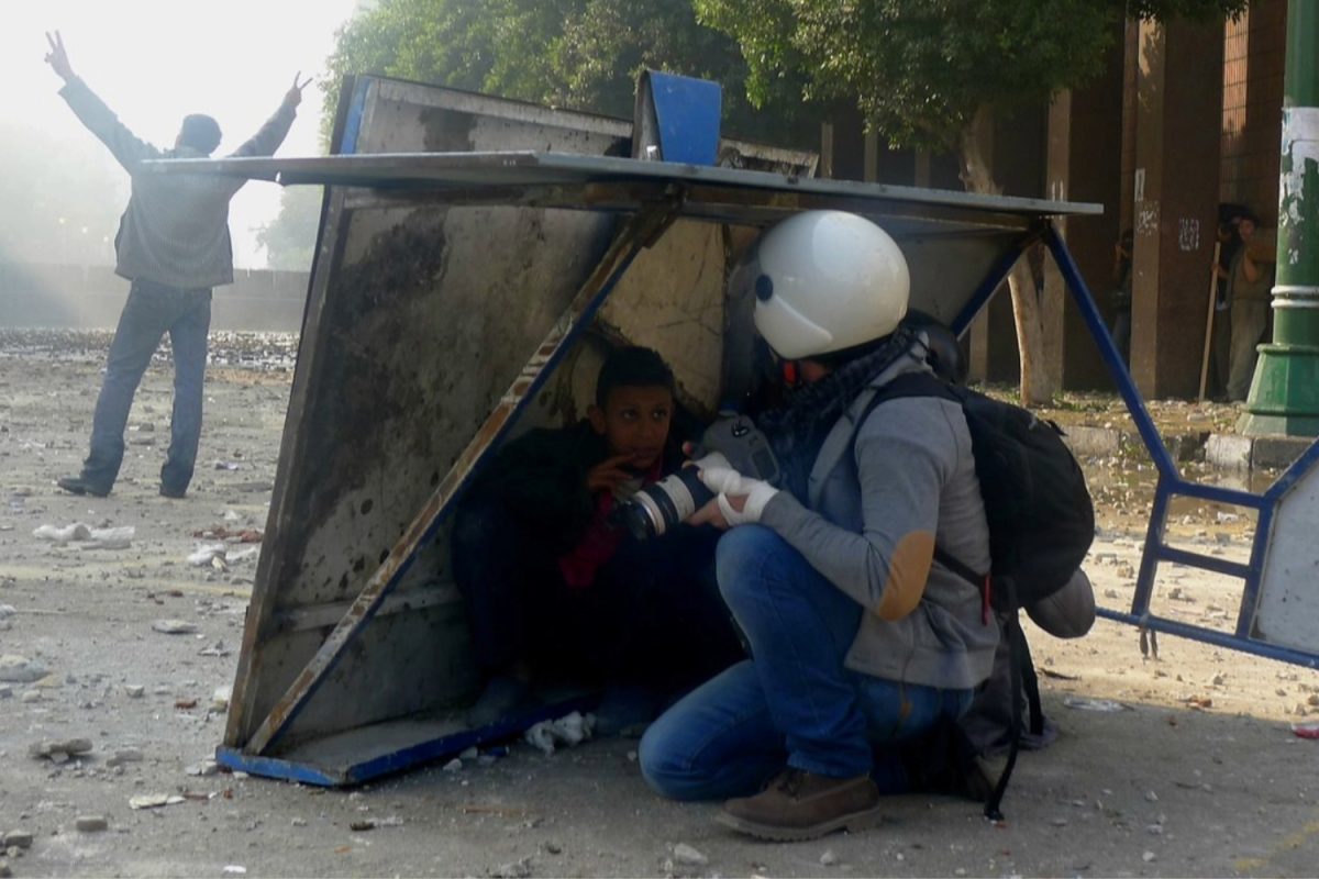 A journalist operates in a dangerous environment, facing physical and emotional risks. Journalists risk their lives every day to inform the public about what is happening around the world. 