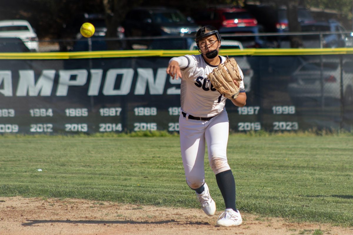 Kan launches a throw to try to cut down a lead runner. Along with playing outfield, Kan also hit a home run, helping drive the Scots' scoring. "We weren't expecting to do that well because we just came back from spring break, but we didn't do too bad," said freshman Bridget Lee.
