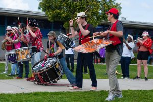 Members of the Leland Stanford Junior University Marching Band perform enthusiastically at Celebrate the Music. During the Battle of the Bands, they faced off against the University of California, Davis, marching band.