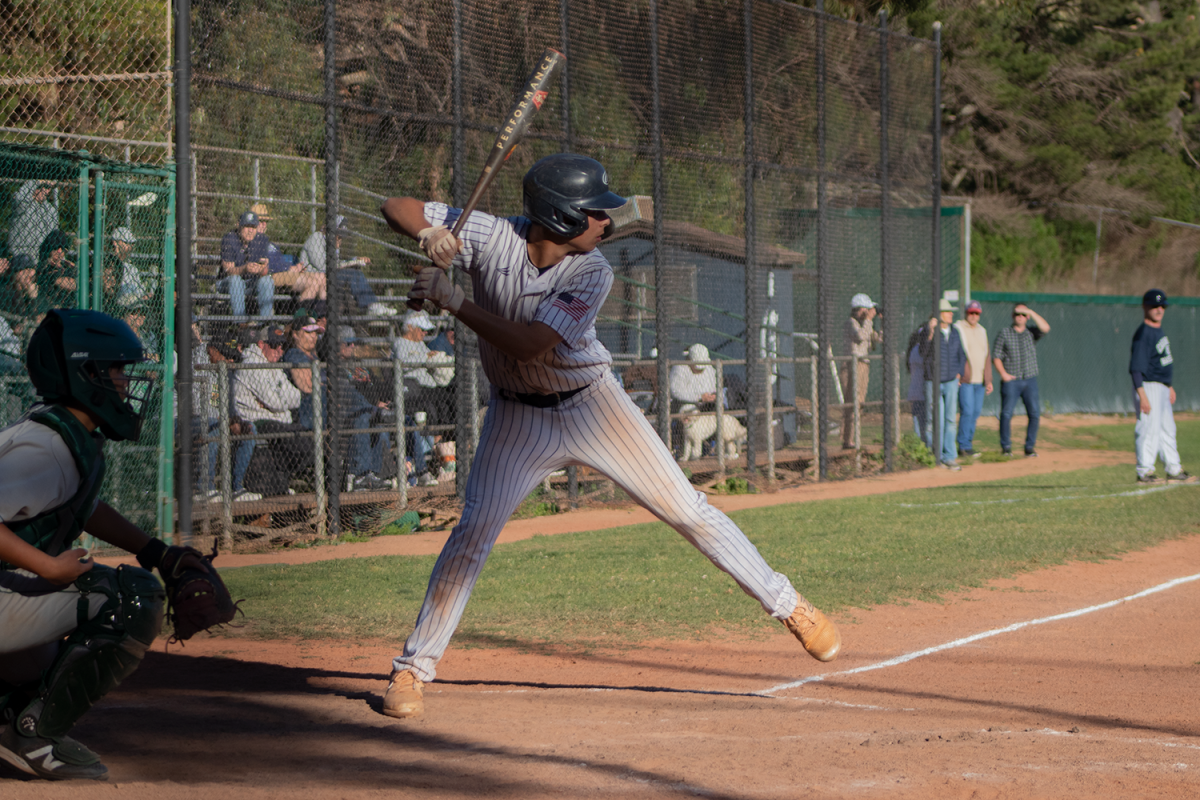 Sophomore Karam Kayali stands at the plate and focuses on the incoming pitch. He hit the ball hard to bring a teammate home and keep the inning alive. This crucial play enabled his team to maintain its lead throughout the last home match of the season. "I think it’s pretty sad. I’m gonna miss a lot of these players. This team’s pretty fun to be around," Kayali said.