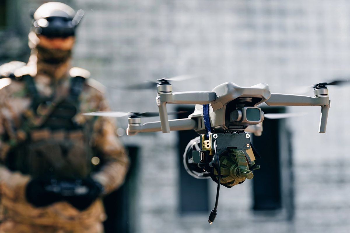 A Ukrainian military soldier operates a drone controller during a reconnaissance mission to observe adversary positions on the battlefield. Ukraine’s military leadership established the Unmanned Systems Forces in 2024 to formalize, standardize, and scale these tactical operations. Grassroots frontline units originally spearheaded the deployment and development of these technologies before they became officially institutionalized, according to Modern War Institute.